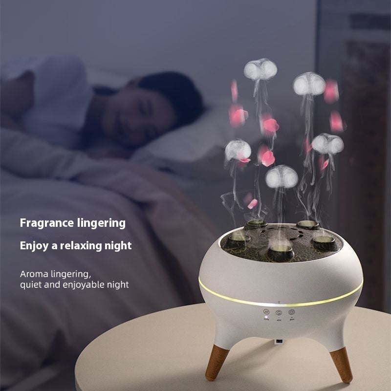 Aromatherapy diffuser on a bedside table with a person sleeping in the background.